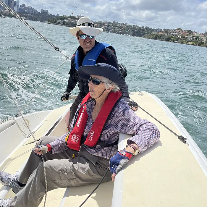 Volunteers and participants relaxing on the dock.