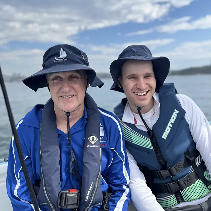 Sail boats with various coloured sails.
